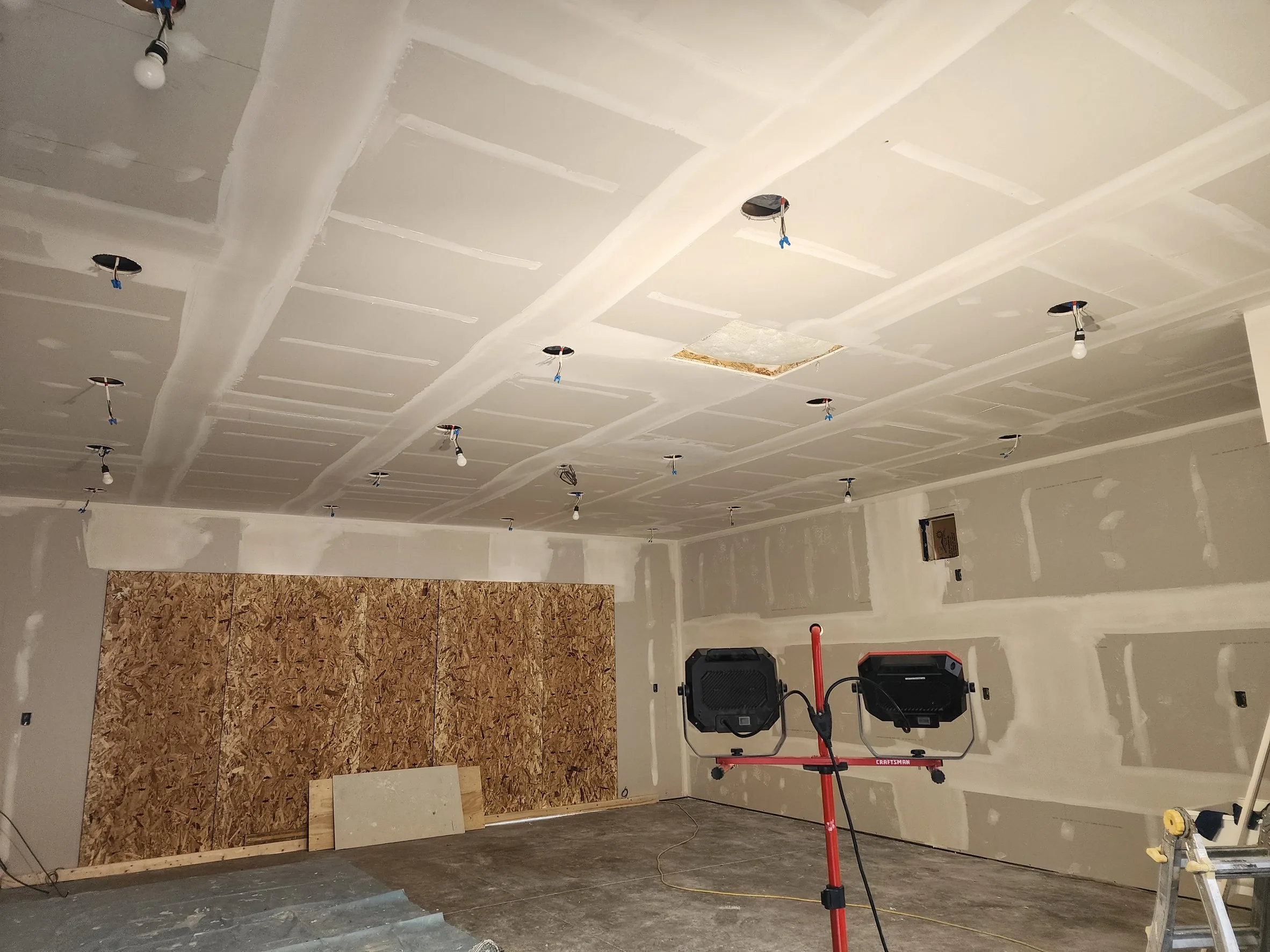 A coffered ceiling boarded and mudded, every seam taped
