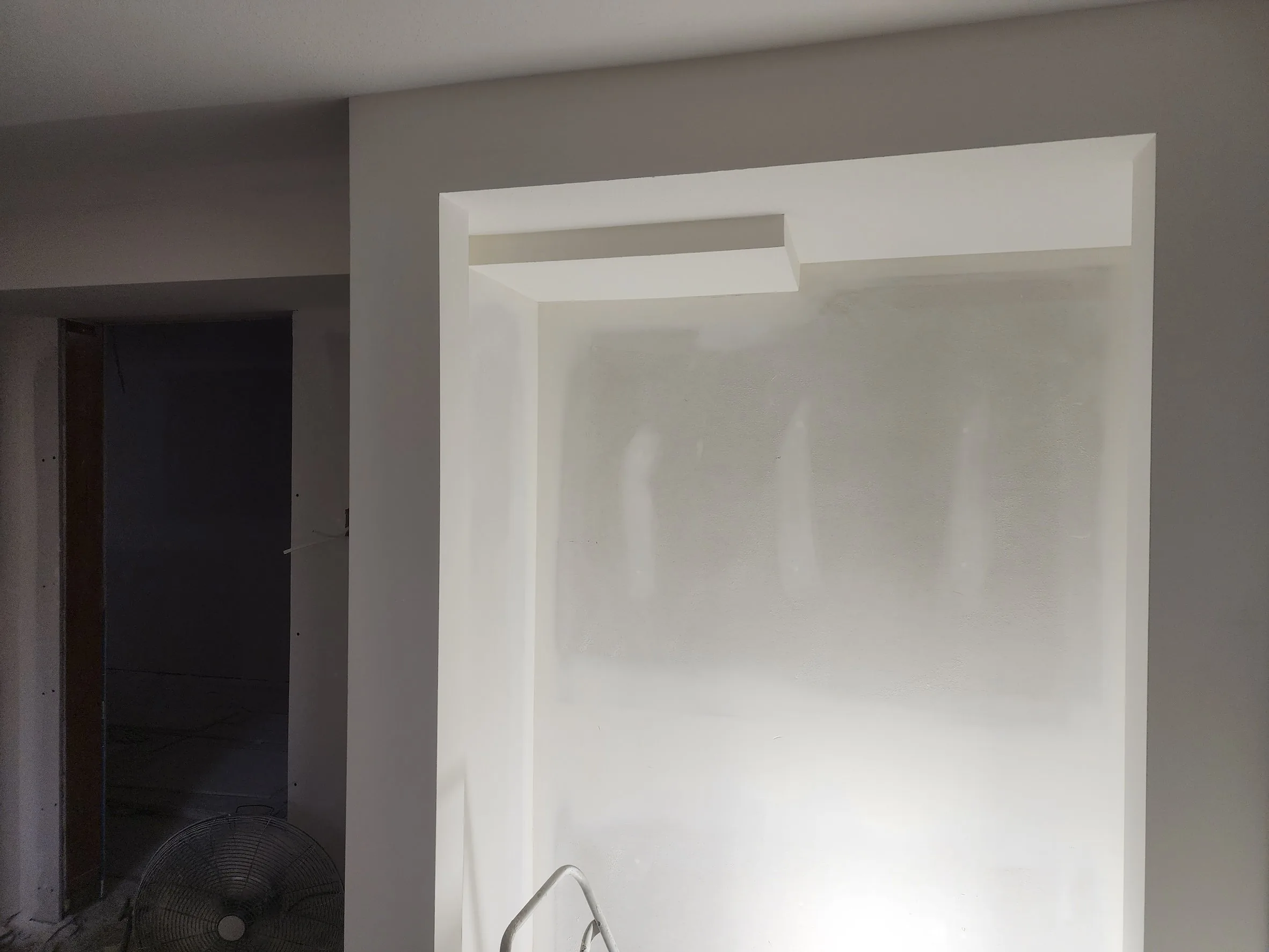 Crisp corner bead and a clean finish around a bulkhead