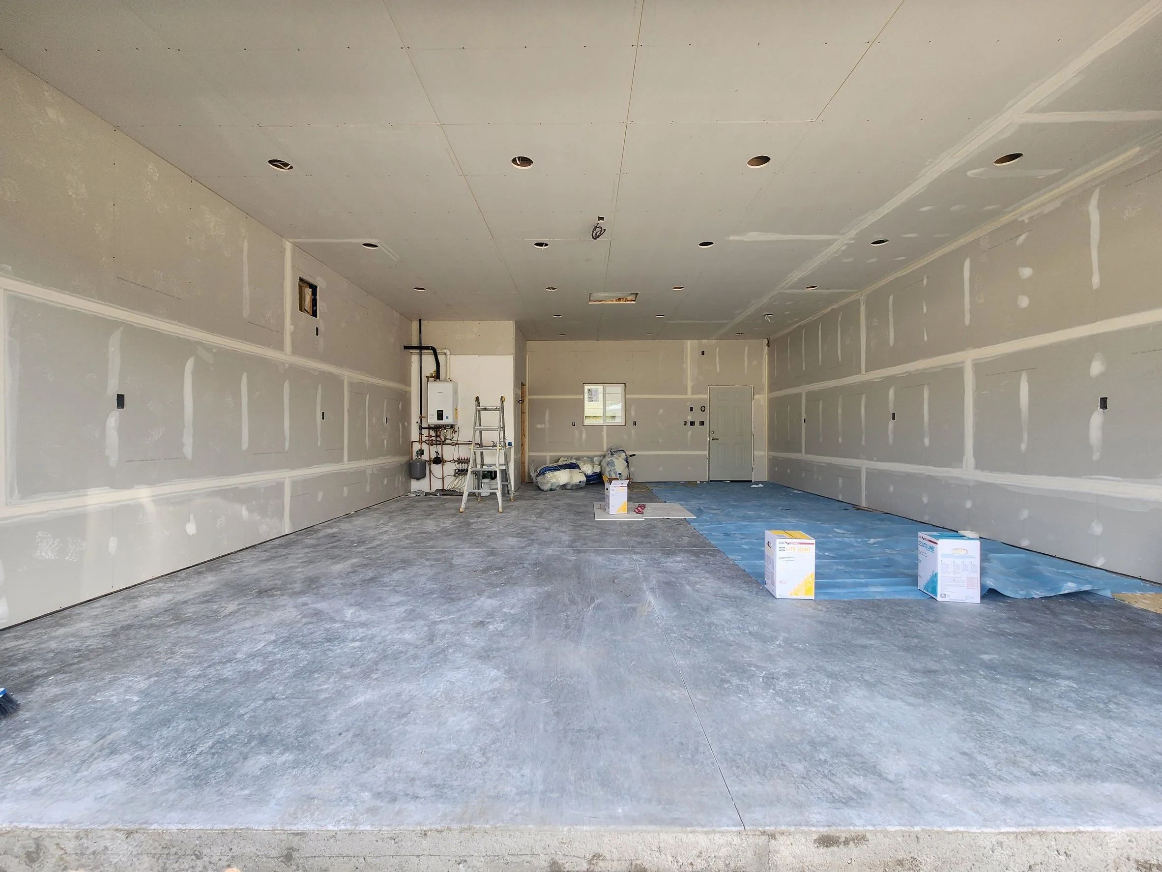 A large space boarded and mudded throughout